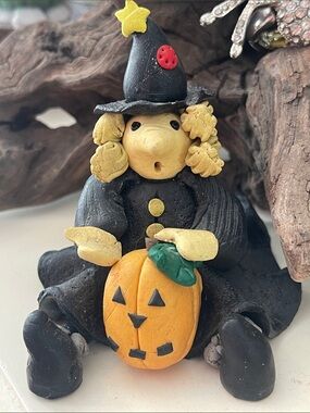 Artisan made Clay Witch with jack-o-lantern holiday decoration